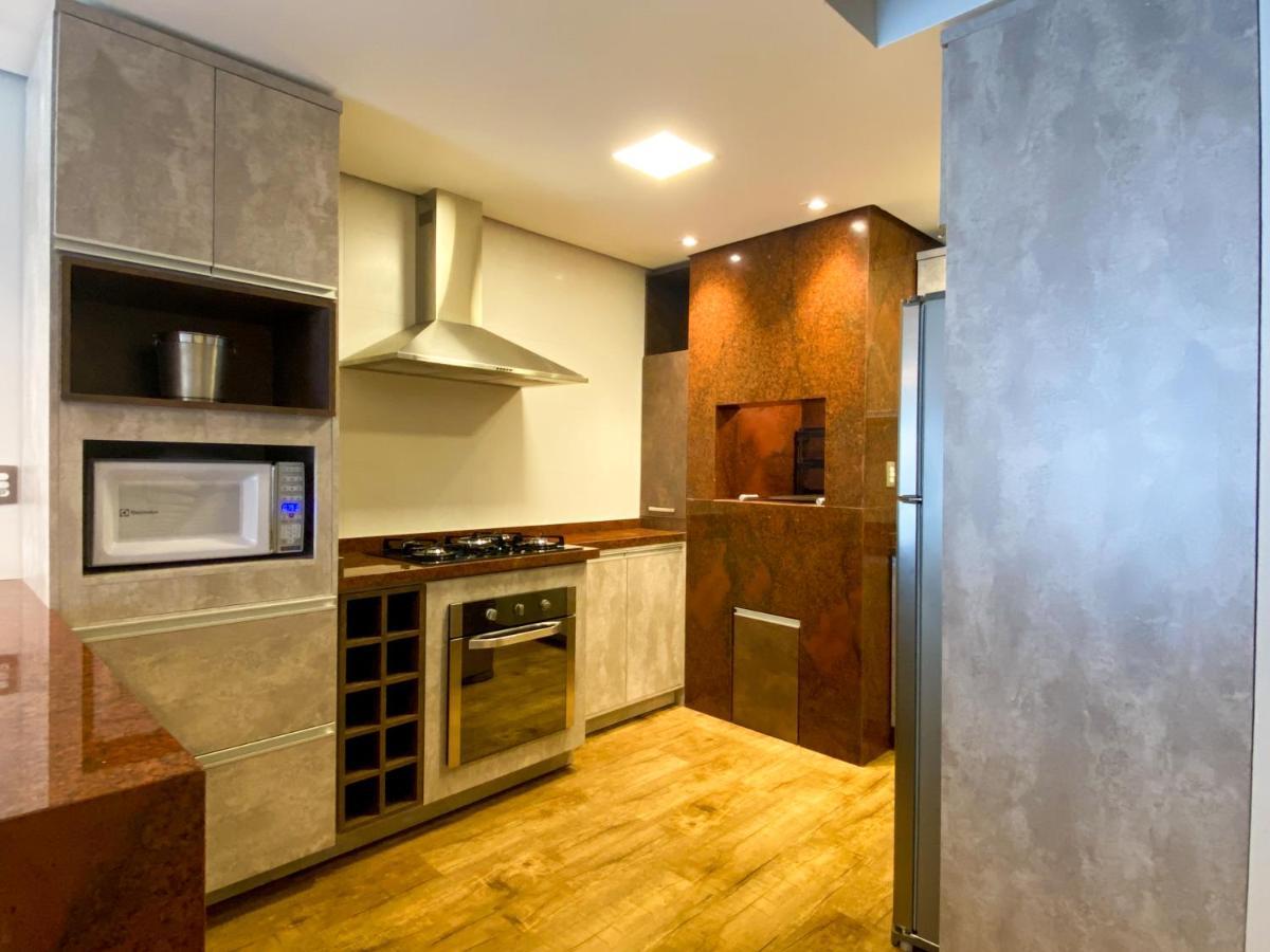 Duplex Com 03 Suites Em 格拉玛多 外观 照片